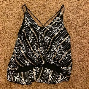 Black stylish blouse with leaf and other fun prints